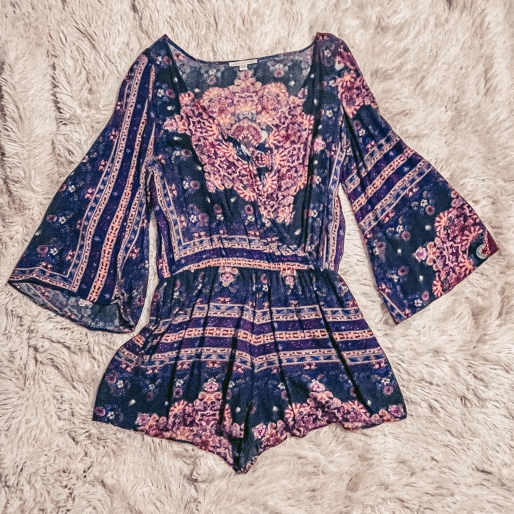 Bell sleeve deep V romper